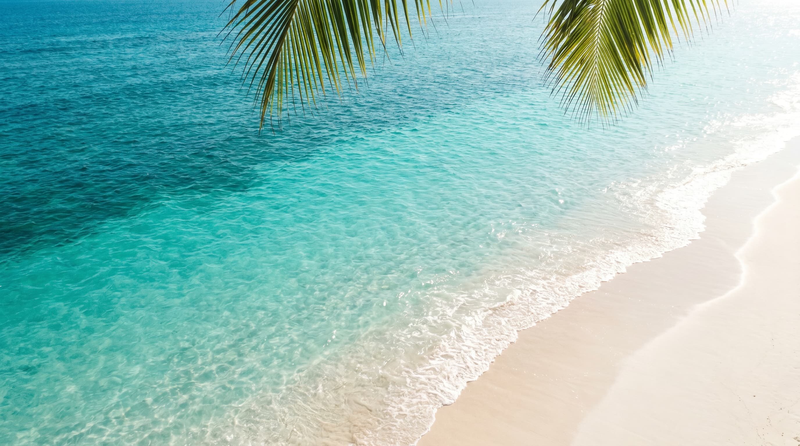 Pristine turquoise ocean water on a clean Bali coast